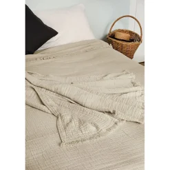 Couvre lit à franges