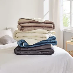 Jeté de lit réversible en velours et microfibre (150x200 cm - Bleu Paon)