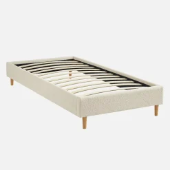 Lit avec sommier à lattes. finition bouclette. blanc. L 203 x P 96.5 x H 30cm