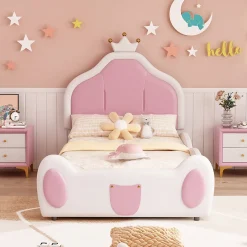 Lit 90x200 cm avec tête de lit en forme de couronne, revêtement simili cuir blanc et rose, cadre métal et panneaux bois