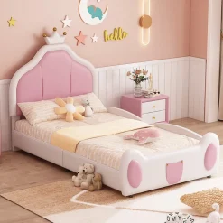 Lit 90x200 cm avec tête de lit en forme de couronne, revêtement simili cuir blanc et rose, cadre métal et panneaux bois