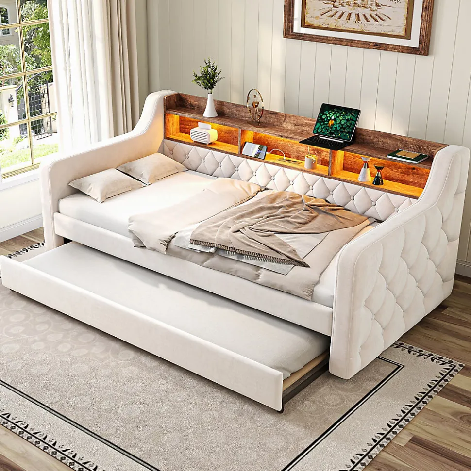 Lit 90x190 cm en velours beige avec rangement intégré, au design moderne et gain de place idéal pour studio