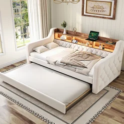 Lit 90x190 cm en velours beige avec rangement intégré, au design moderne et gain de place idéal pour studio