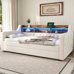 Lit 90x190 cm en velours beige avec rangement intégré, au design moderne et gain de place idéal pour studio