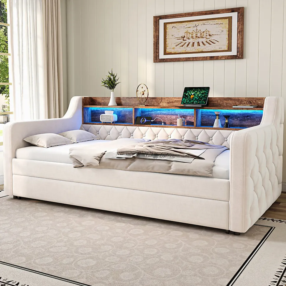 Lit 90x190 cm en velours beige avec rangement intégré, au design moderne et gain de place idéal pour studio