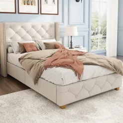 Lit 90x200 cm tapissé lin beige avec tête de lit capitonnée, clous décoratifs et pieds en bois renforcés