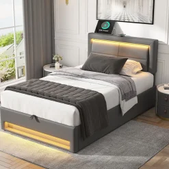 Lit 90x200 cm tapissé PU gris avec éclairage LED, ports USB escamotables et rangement intégré