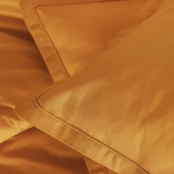 Taie d'oreiller Carina coton 50x70cm jaune cumin - Atmosphera